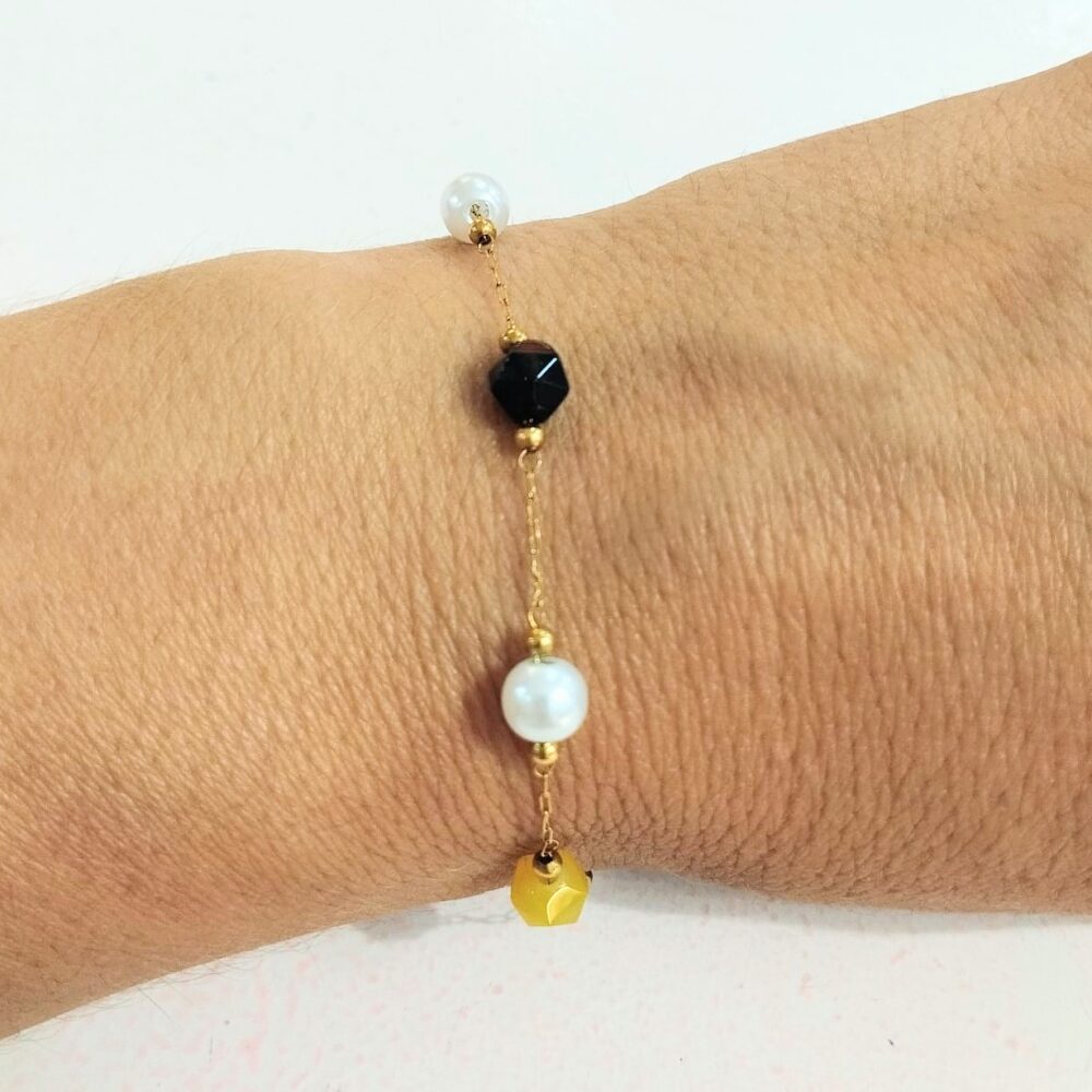 Pulsera bolitas bicolor amarillo y negro+perlas