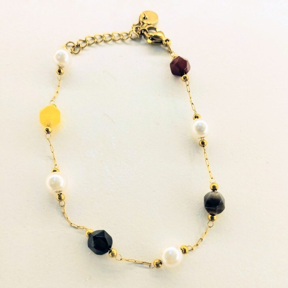 Alternative view of Pulsera bolitas bicolor amarillo y negro+perlas