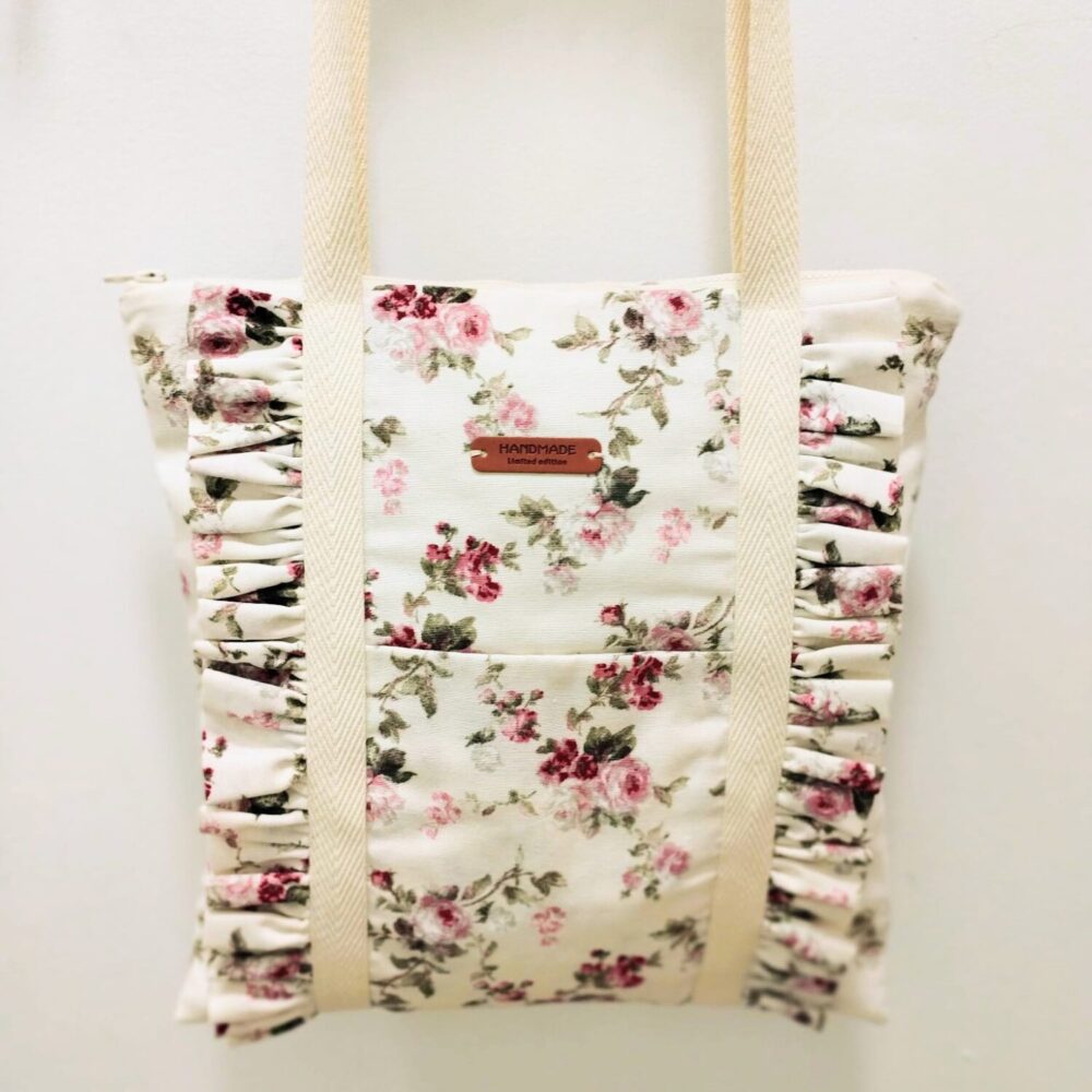 Bolso tela estampado volantes (flores rosas)